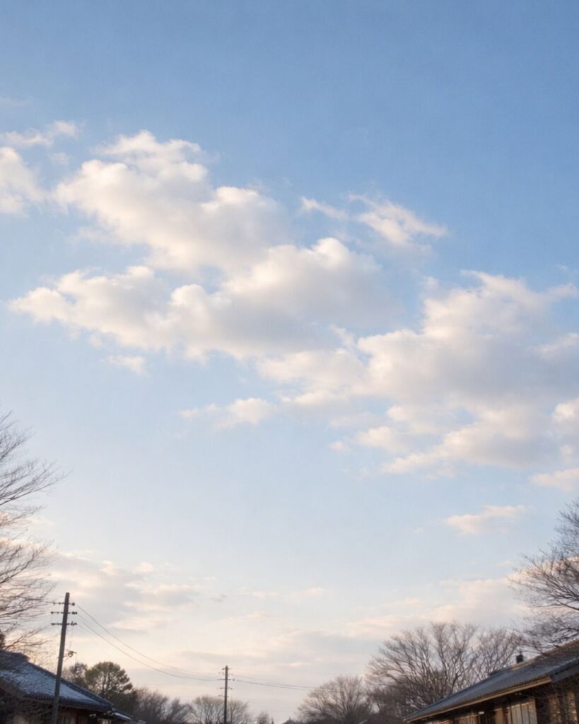 わたぼうし短歌帖「年のくれ　青をゆらりと　ひつじ雲
急がずにゐよと　言はれしやうな」短歌イメージ画像